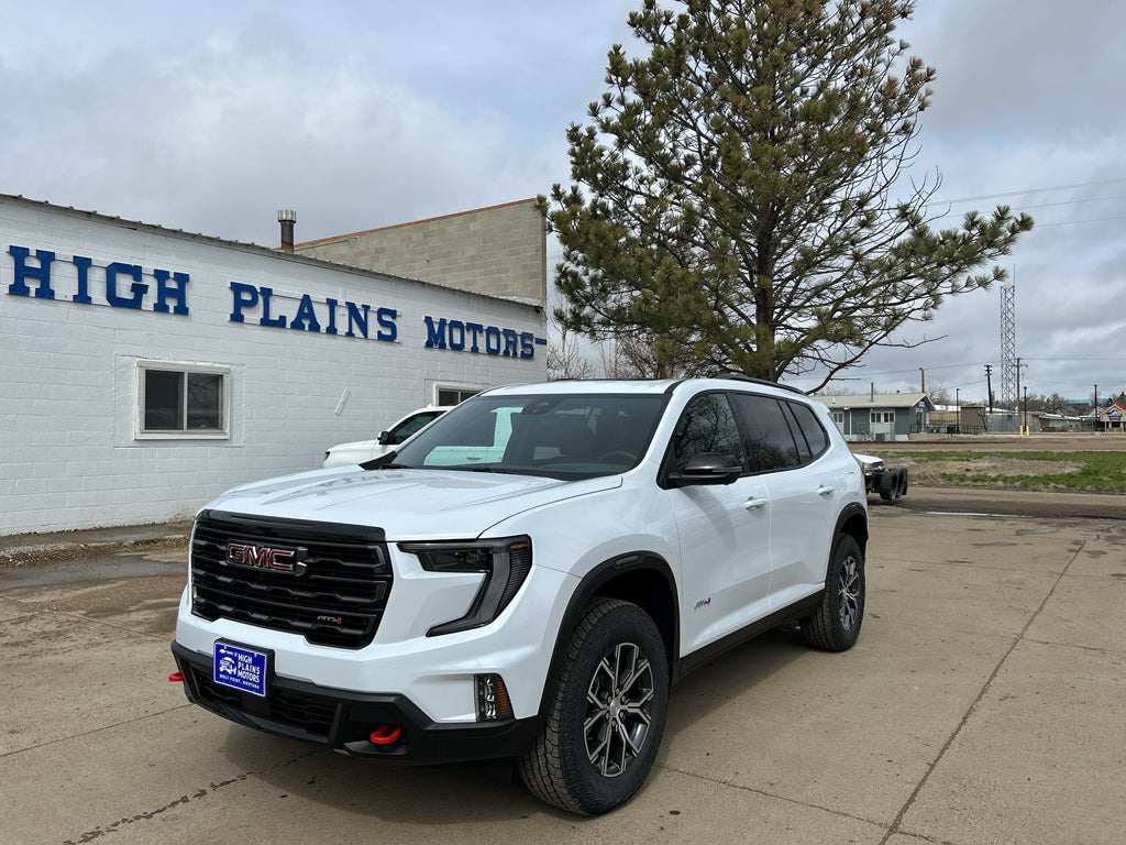 2026 GMC Acadia AT4 in Glacier White Tricoat — front three-quarter view