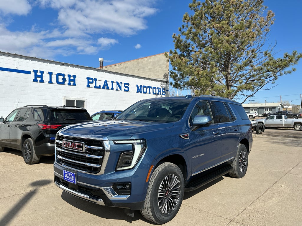2026 GMC Yukon Elevation in Downpour Metallic — front three-quarter view